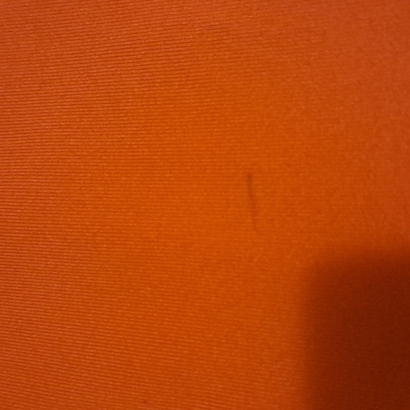 This is a Nike youth sweatshirt, size 6-7. Color: Orange - Picture 2 of 4